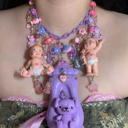 Purple baby bottle babies