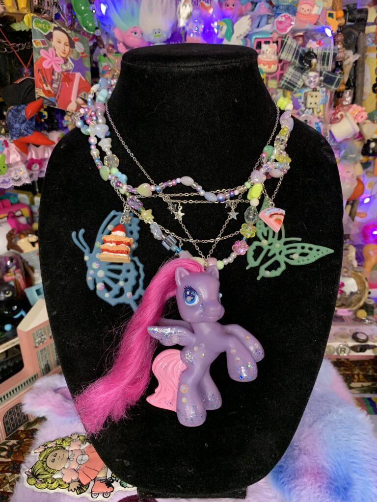 Purple and pink pony